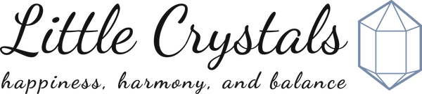 Little Crystals logo heading features the words little crystals along with an image of a crystal.