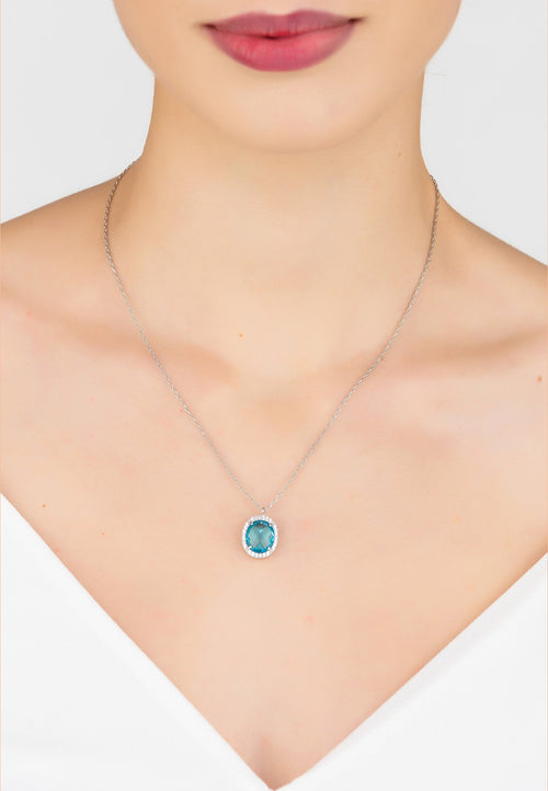 Model wears the Oval Gemstone Pendant Necklace Silver Blue Topaz Hydro