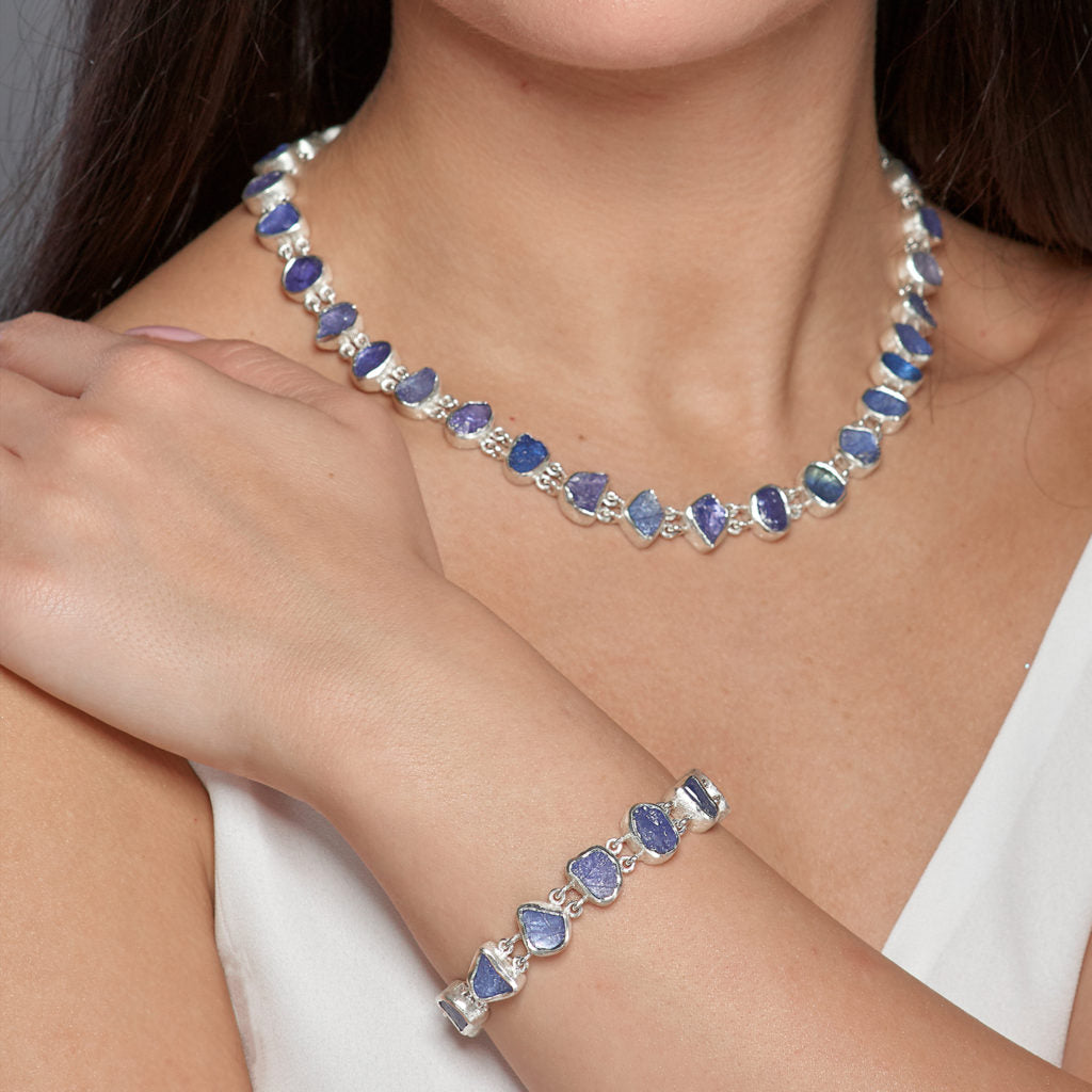 Model wears Tanzanite birthstone necklace and bracelet.