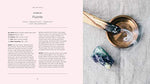 An open page in the book Crystals: The Modern Guide to Crystal Healing. The page is opened to the fluorite crystal and accompanying text.