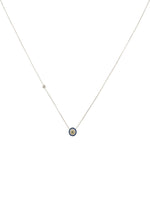 Photo that depicts the size of the evil eye gemstone necklace in silver finish.
