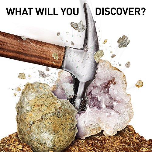 A hammer is smashing a geode revealing the crystal inside.