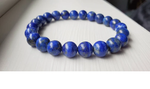 Close up of 8mm Lapis Lazuli gemstone bracelet