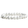 White Howlite Bracelet against a clear background.